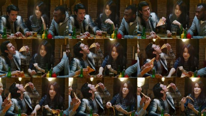 慢动作下，快乐的朋友们在餐厅或酒吧享用意大利披萨和啤酒。