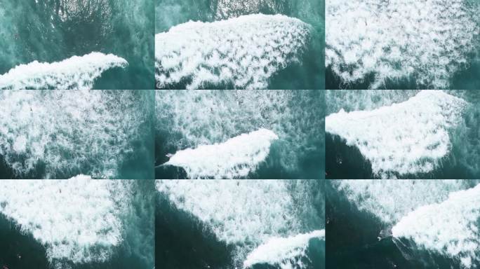 海浪涌动的海面上的冲浪者们