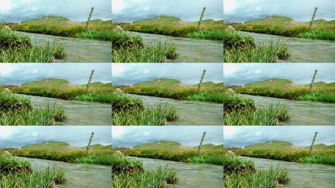 高原平静流淌的小河河水特写