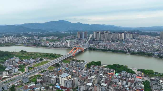 容县航拍橙色拱桥城市全景