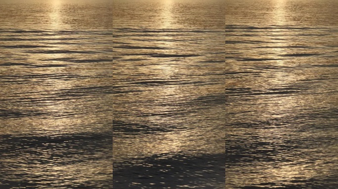 金色夕阳下海面波光粼粼竖屏背景