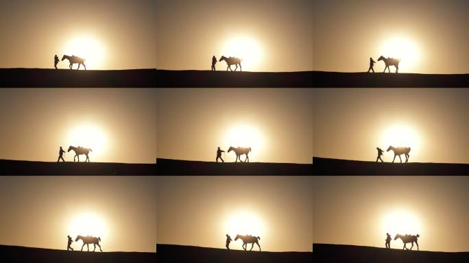 戈壁落日 行者牵马前行