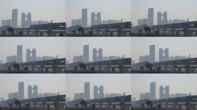 《高铁过城市 现代都市交通与天际线素材》