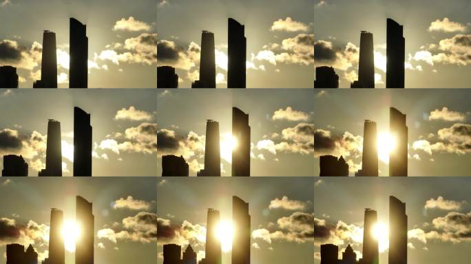 广州城市日出珠江新城高楼夕阳下的摩天大楼