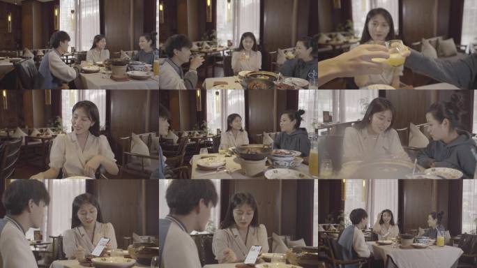 朋友聚餐举杯碰杯餐厅多人欢乐吃饭