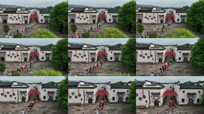 徽派古建筑群中的跑步人群