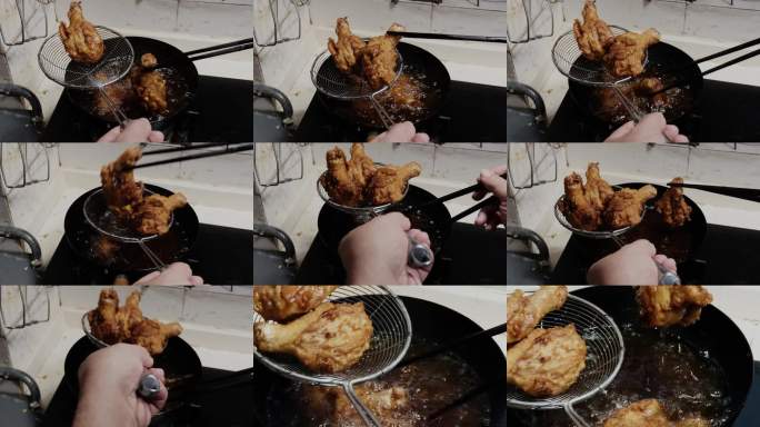 一位厨师在使用油锅炸鸡腿