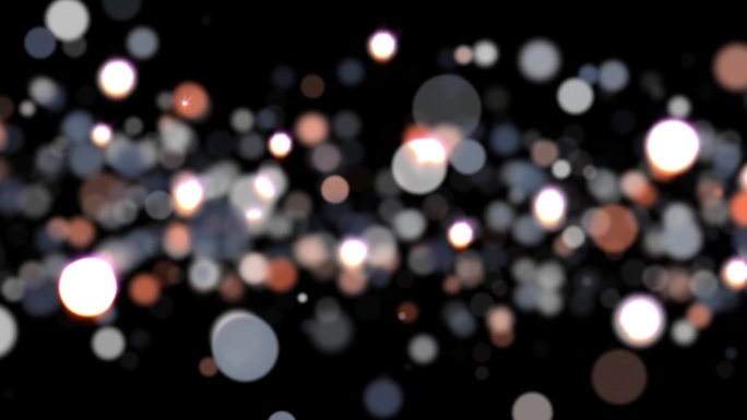 闪亮的粒子和星星。黑色背景上的尘埃粒子