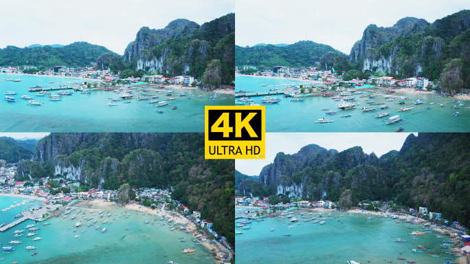 菲律宾巴拉望爱妮岛海湾渔船与山峦