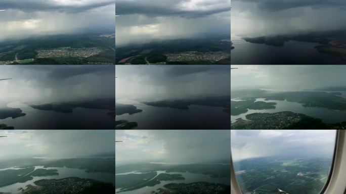 飞机窗外暴雨 飞机舷窗外的云层与大地